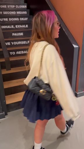 Flirty skirt chaser exposes her ass and shows off her socks in public