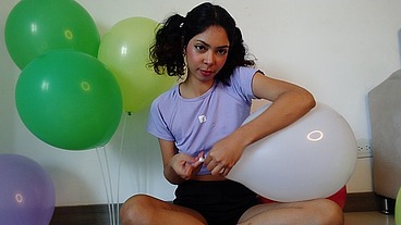 Pigtailed blowing and having fun