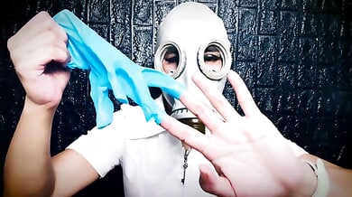 Russian latex mistress whispers through a medical gasmask in an ASMR session
