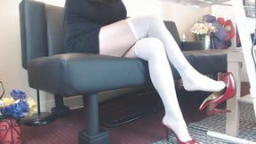 Sexy white stockings dangling red heels
