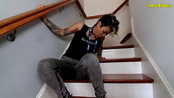 Asian MILF Loosey wetting her tight jeans on stairs