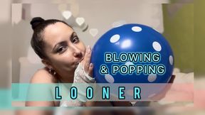 Blowing up and popping polka dot balloons - sexy girl practices masturbation with balloons