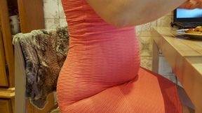 About to burst in pink dress