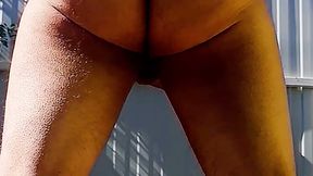 Coco squirting in my garden