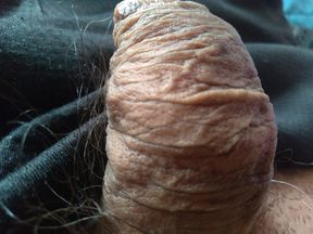 Gay man lovingly rubs his super dick