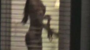 Magnificent girl living next building walks naked in her apartment