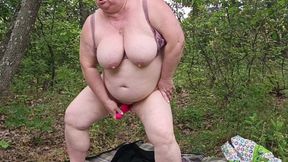Mother-in-law Undressed in a Park and Masturbates Her Pussy