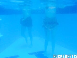 2 beauties pool underwater getting lascivious