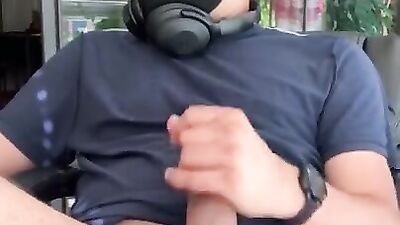 Masked chap is jerking off in front of the camera