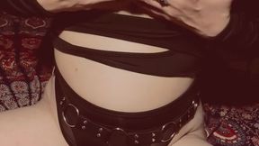 Big titties get moisturized in leather boots