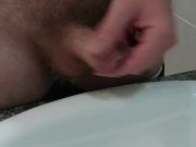 Woke uo horny and wanked in the bathroom
