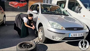 DIRNDL SLUT GETS DIRTY AND OILY CHANGING TIRES