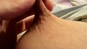Playing with my wife's big natural tits in the bedroom