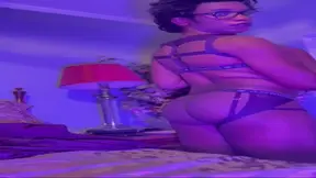 Stripping in purple harness lingerie