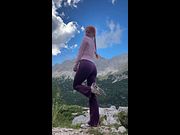 Redhead with braids hiking outdoors