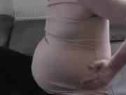 pregman with contractions and clothes