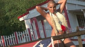 Stylish bald angel with nice long legs poses naked at the farm