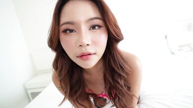 Beautiful Asian girl warms up my cock before we fuck