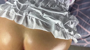 The ass of a sporty girl with perfect skin is fucked by a big dick in anal