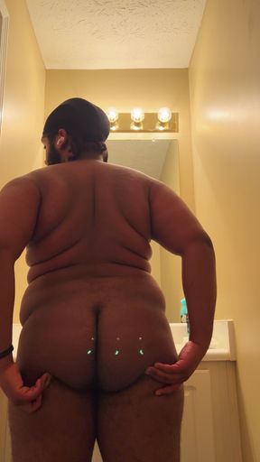 NymphoRogue Strokes Cock In Bathroom