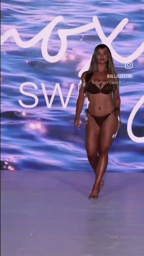 Sexy swimsuit model on runway
