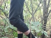 A young guy studies himself in nature