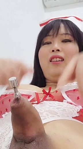 The Sultry Nurse Stretches Her Urethral Opening