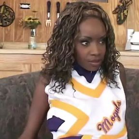 Pretty ebony cheerleader enjoys white cock banging