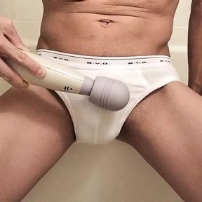 Wear white BVD bikini briefs and masturbate with an electric massage machine.