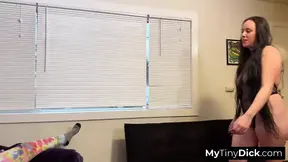 A voluptuous mistress in fishnets jerking his small dick