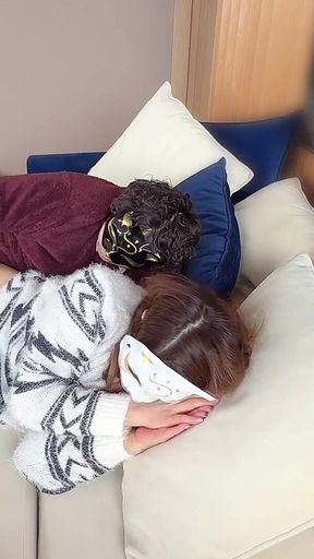 On the Sofa in Their Secret Room, They Shared Passionate Kisses Before Making Love, Expressing Their Deep Love.