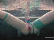 Axel Abysse fists his cunt by the pool