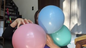 Natural long nails popping balloons