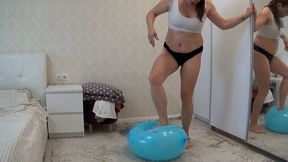 Inflate blue punch ball and blow it up by jumping with feet c