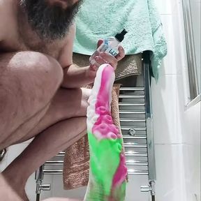 Chastiy locked bear with monster dildo