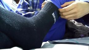 Playing with my black socks and barefeet before rest