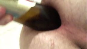 Husband arse play bottle insertion