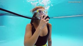 A perfect brunette babe Katya Nakolkina underwater