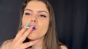 Smoking cigarettes with purple lipstick close-up