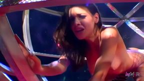 Exotic lesbian dancers rub their bodies together on stage and pleasure themselves with sex toys