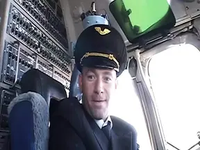 Hot pilot gets intimate with sexy brunette