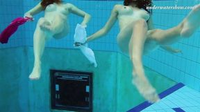 Lera and Sima glide through the water