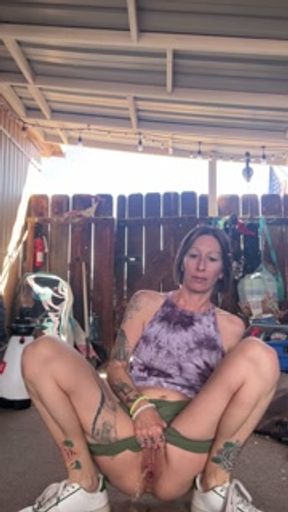 Piss Slut pissing under deck cover just for you!