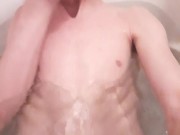 Very skinny wet teen shows off his ribs while in bathtub