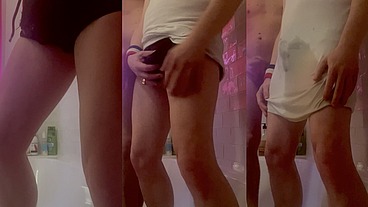Amateur boy jerks-off in the bathtub as he watches his flatmate piss on himself and wet his t-shirt