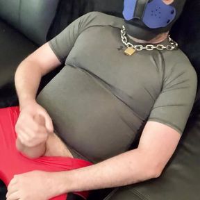 Muscle pup jerks off in under armor spandex