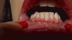 Red lips, evil teeth