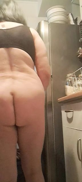 stepmother entertaining in the kitchen naked