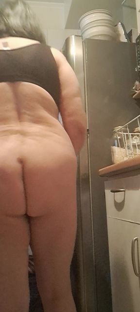 stepmother entertaining in the kitchen naked