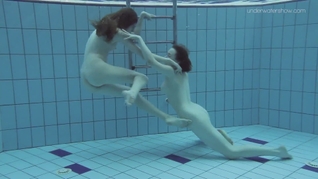 Two dressed beauties underwater Anna Netrebko and Lada Poleshuk